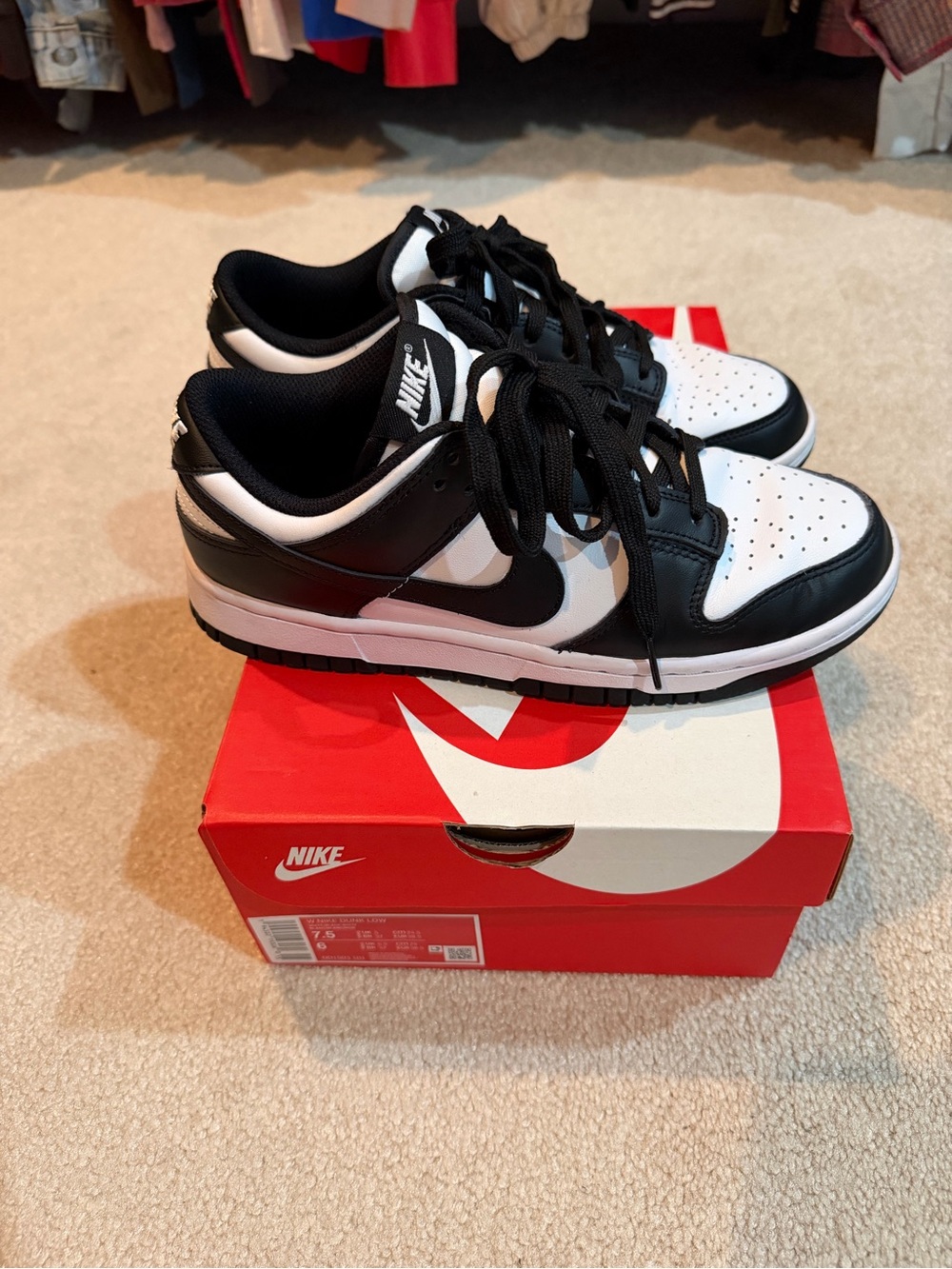 Nike women’s Black and White Low-Top Sneakers